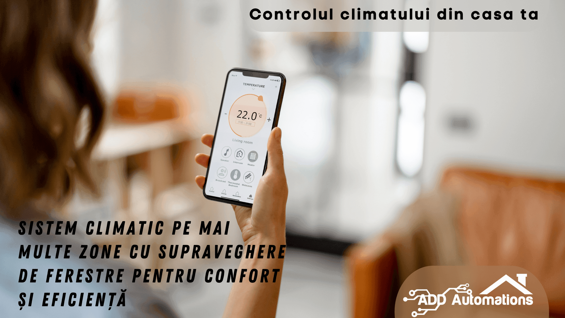 Person holding smartphone with home climate control app, showing temperature settings and icons.